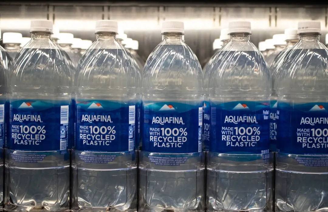 Bottles of aquafina water made with recycled plastic.