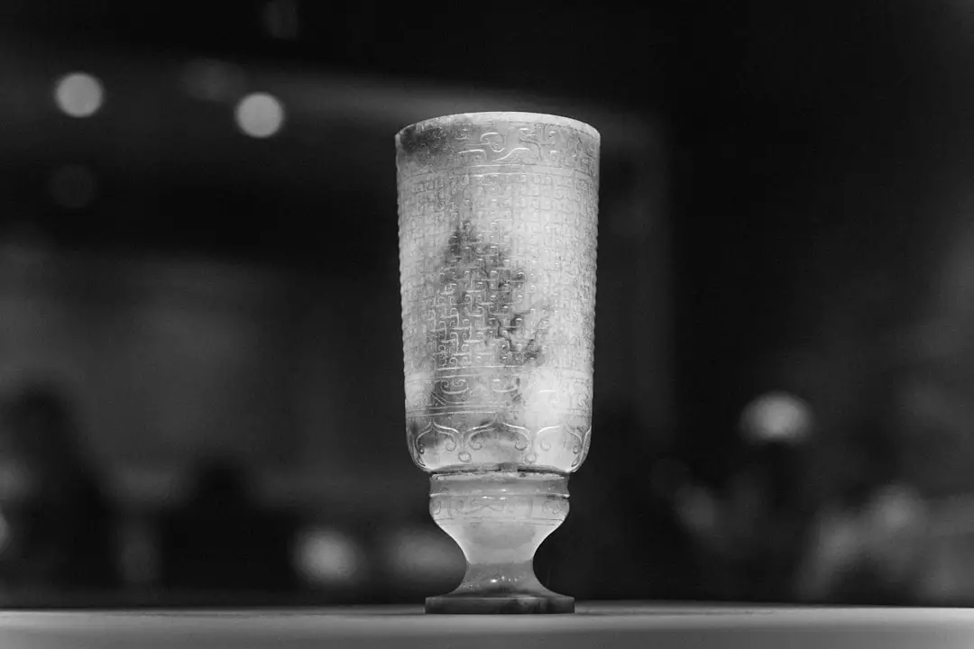 A tall, ancient vessel is on display.
